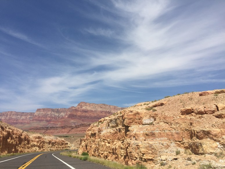 Driving past Vermillion Cliffs in southern Utah, listening to the Mad Max soundtrack, duh.